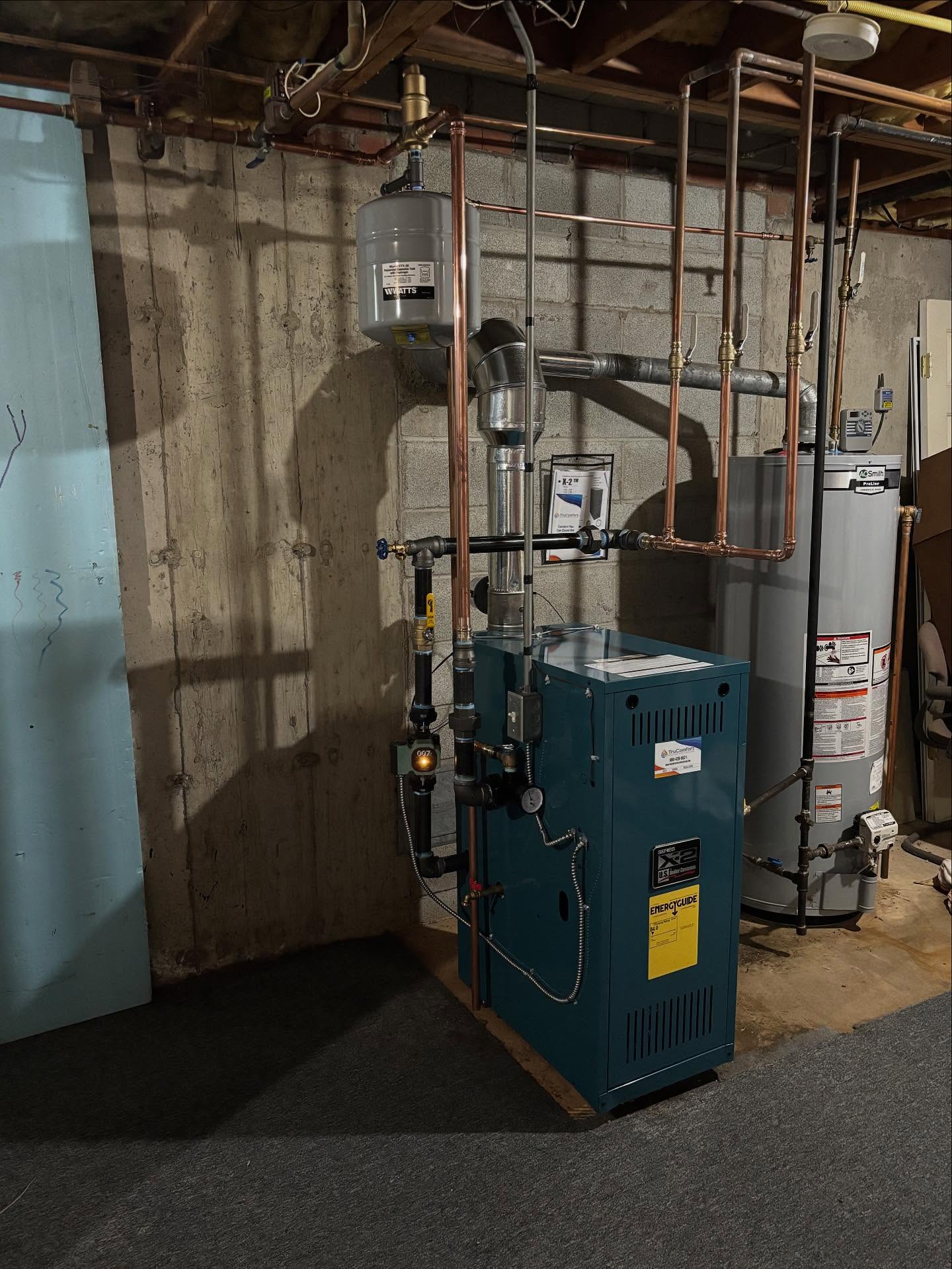 Furnace Install Southington CT Berlin St New hydronic boiler installation with copper piping in Southington CT basement.